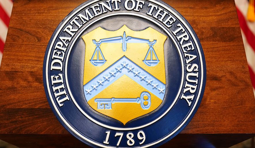 The seal of the Treasury Department is pictured before Treasury Secretary Scott Bessent arrives to speak at a news conference, Monday, Aug. 24, 2026, at the Treasury Department in Washington. (AP Photo/Julia Demaree Nikhinson)