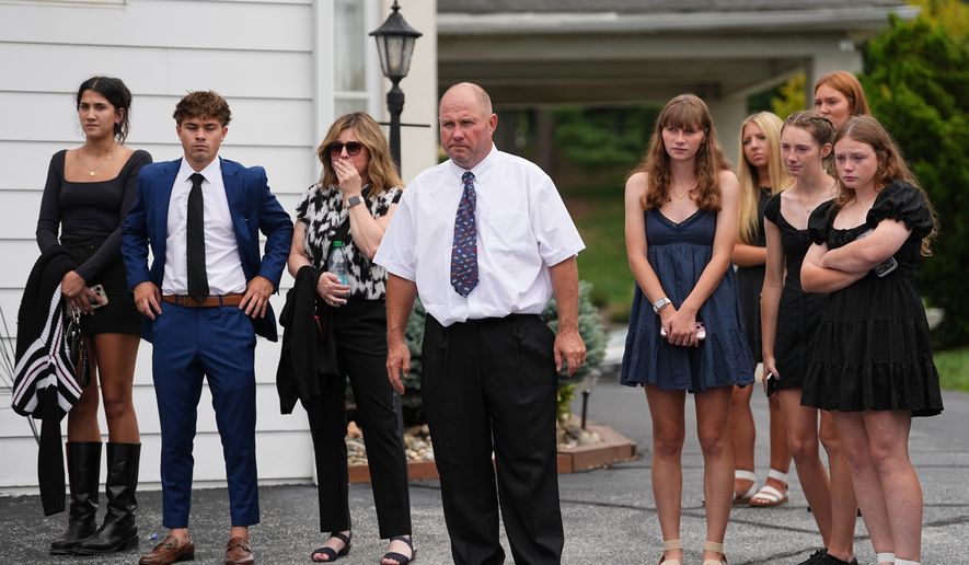 Glenwood Pysher III, watches as pallbearers carry a casket containing the remains of his son Glenwood "Bubba" Pysher IV who was killed by police, in Pottstown, Pa., Monday, Aug. 31, 2026. (AP Photo/Matt Rourke)
