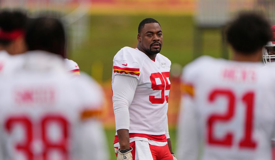 Kansas City Chiefs defensive tackle Chris Jones (95) waits to start a drill during NFL football training camp Tuesday, Aug. 11, 2026, in St. Joseph, Mo. (AP Photo/Charlie Riedel) ** FILE **