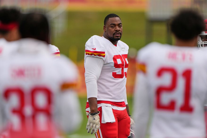 Kansas City Chiefs defensive tackle Chris Jones (95) waits to start a drill during NFL football training camp Tuesday, Aug. 11, 2026, in St. Joseph, Mo. (AP Photo/Charlie Riedel) ** FILE **