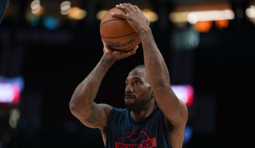 Los Angeles Clippers forward Kawhi Leonard warms up before an NBA basketball game April 10, 2026, in Portland, Ore. (AP Photo/Jenny Kane, File)