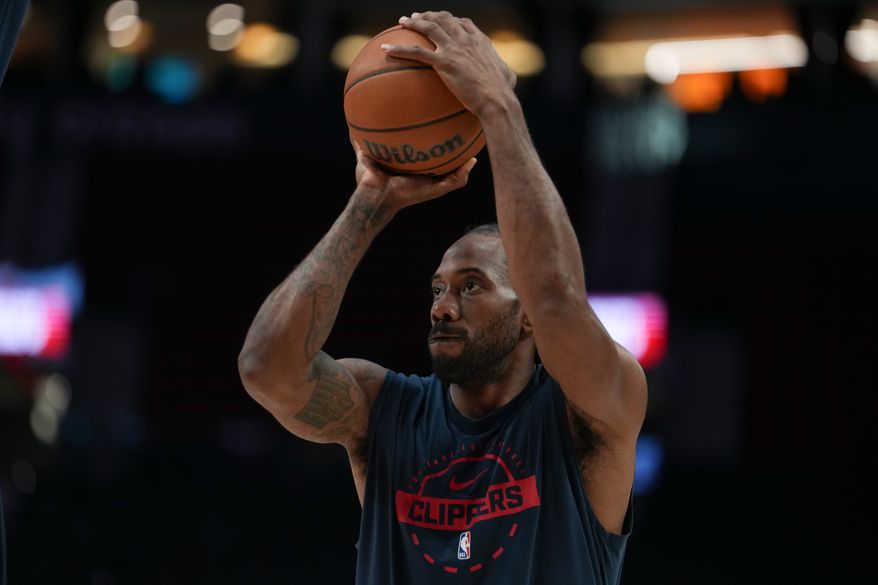 Los Angeles Clippers forward Kawhi Leonard warms up before an NBA basketball game April 10, 2026, in Portland, Ore. (AP Photo/Jenny Kane, File)