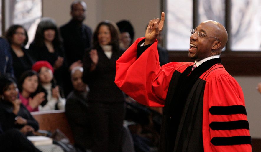 FILE - The Rev. Raphael Warnock delivers a sermon during a church service at Ebenezer Baptist Church in Atlanta on Sunday Jan. 18, 2009. (AP Photo/John Amis, File)