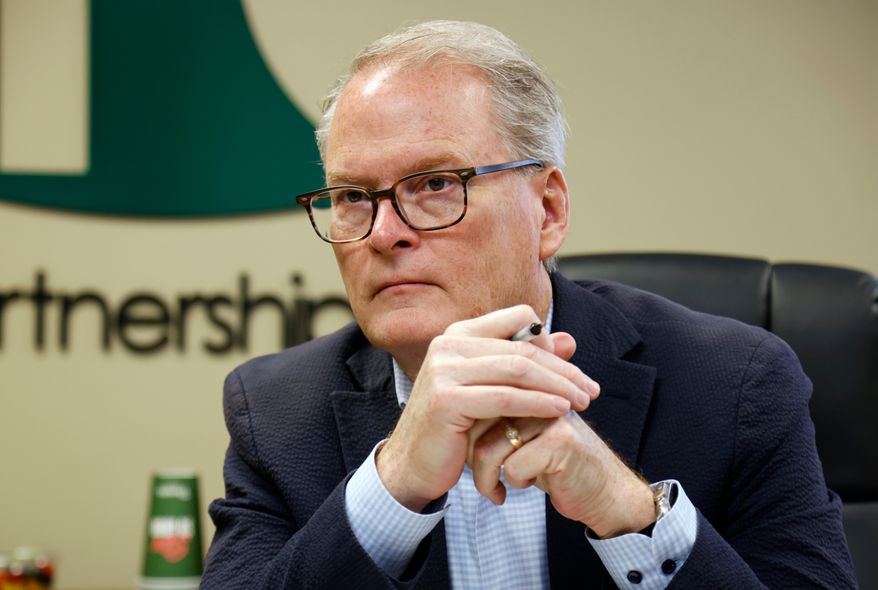 Democratic U.S. senatorial candidate Adam Hamilton of Kansas listens to administrators at the Health Partnership Clinic as they discuss funding issues the low-income family medical facility is facing in Olathe. Kan., on Wednesday, Aug. 12, 2026. (AP Photo/Colin E. Braley) **FILE**