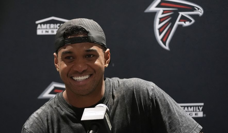 Atlanta Falcons quarterback Tua Tagovailoa speaks at a news conference after an NFL preseason football game against the Miami Dolphins, Friday, Aug. 28, 2026, in Miami Gardens, Fla. (AP Photo/Lynne Sladky)