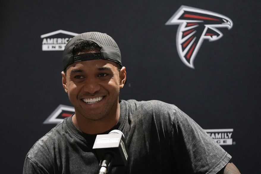 Atlanta Falcons quarterback Tua Tagovailoa speaks at a news conference after an NFL preseason football game against the Miami Dolphins, Friday, Aug. 28, 2026, in Miami Gardens, Fla. (AP Photo/Lynne Sladky)
