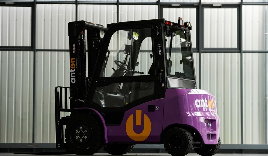 A vehicle of Chinese manufacturer EP Equipment is parked at the assembly line of forklift and warehouse manufacturer Jungheinrich in Moosburg, Germany, Tuesday, Aug. 25, 2026. (AP Photo/Matthias Schrader)