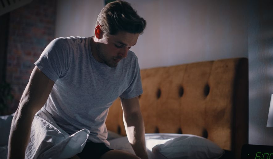 Experts suggest getting out of bed for a little while may be a better option than lying in bed and waiting if you find yourself waking up in the middle of the night.(Photo by Gorodenkoff on Shutterstock)