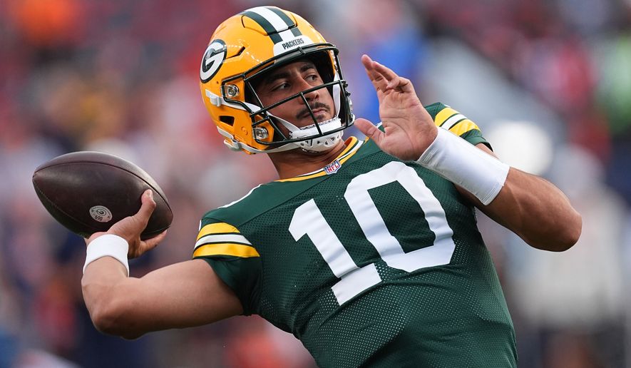 Green Bay Packers quarterback Jordan Love (10) warms up before an NFL preseason football game against the Denver Broncos, Friday, Aug. 21, 2026, in Denver. (AP Photo/David Zalubowski)