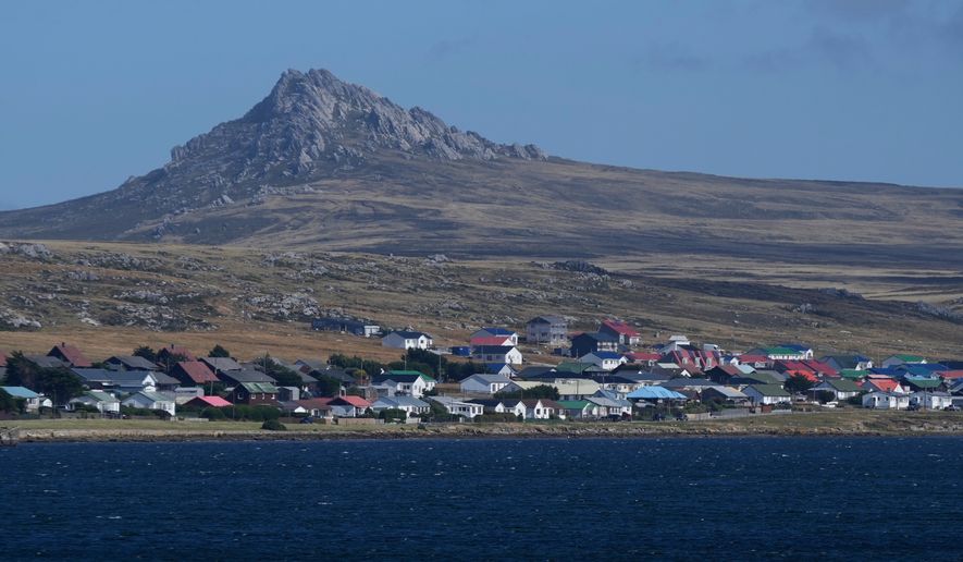 Mount Tumbledown stands tall behind Stanley on the Falkland Islands, also known as Islas Malvinas, on March 16, 2026. (AP Photo/Ricardo Mazalan, File)