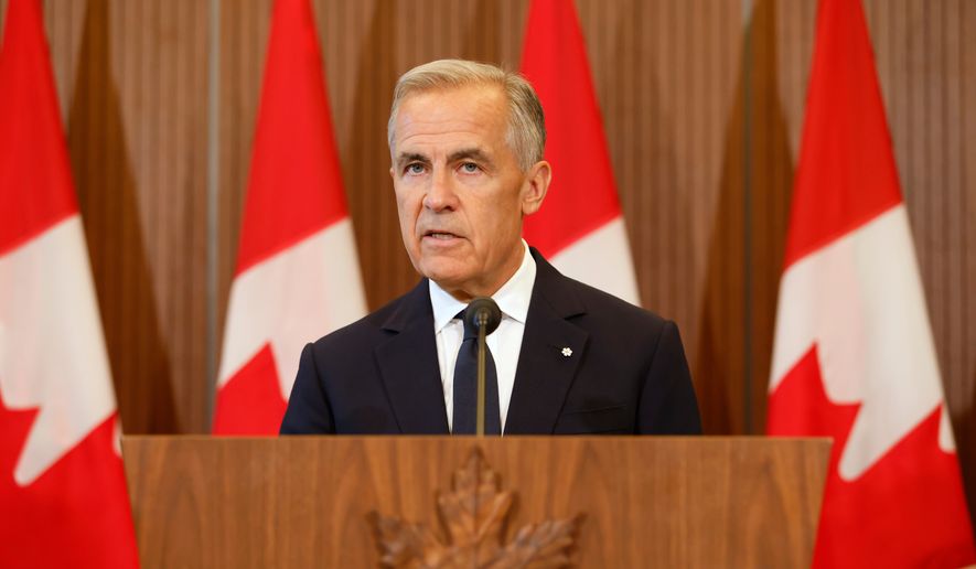 Prime Minister Mark Carney speaks about Canada's response to new U.S. tariffs during a news conference on Parliament Hill in Ottawa on Saturday, Aug. 22, 2026. (Patrick Doyle/The Canadian Press via AP) ** FILE **