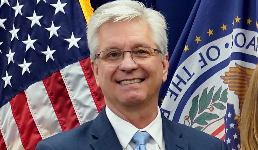 FILE - Federal Reserve Board of Governors member Christopher Waller poses for a photo on May 23, 2022, in Washington. (AP Photo/Patrick Semansky, File)