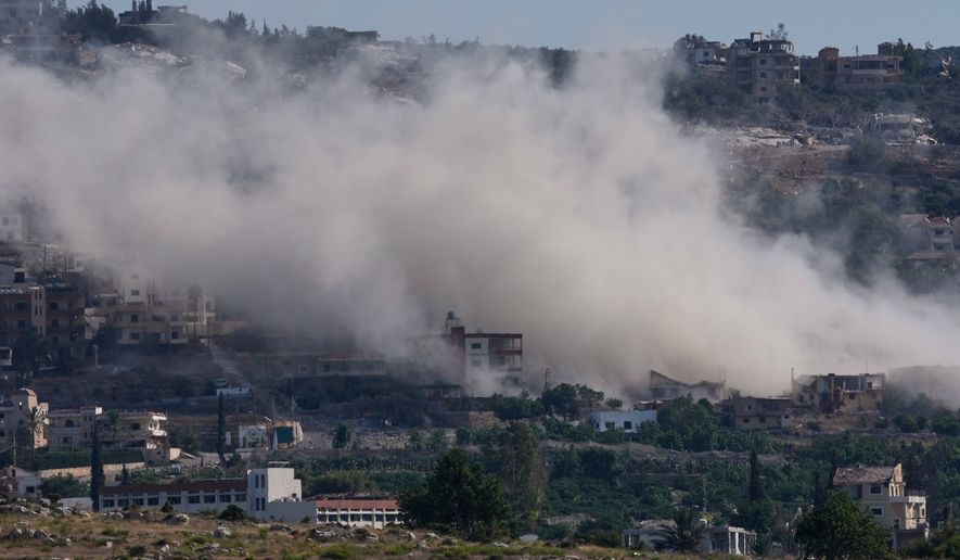 Smoke rises as Israeli forces demolish homes in Mansouri village, southern Lebanon, Thursday, Sept. 3, 2026. (AP Photo/Mohammed Zaatari)