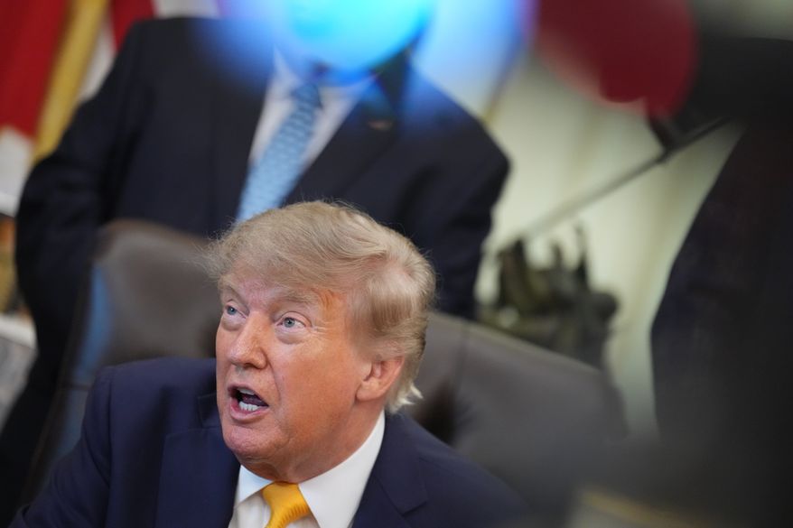 President Donald Trump speaks and announces action to help farmers and ranchers, as a group of farmers and ranchers stand behind, Friday, Sept. 4, 2026, in the Oval Office of the White House, in Washington. (AP Photo/Jacquelyn Martin)
