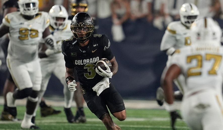 Colorado wide receiver DeAndre Moore Jr. (3) runs against Georgia Tech during the first half of an NCAA college football game, Thursday, Sept. 3, 2026, in Atlanta. (AP Photo/Mike Stewart)