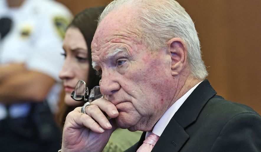 Defense attorney Kevin Reddington and defendant Lindsay Clancy listen to Judge William Sullivan speak with the jury after declaring a mistrial at court in Plymouth, Mass., on Friday, Sept. 4, 2026. (Greg Derr/The Patriot Ledger via AP, Pool)