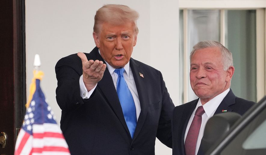 President Donald Trump greets Jordan's King Abdullah II at the White House, Tuesday, Feb. 11, 2025, in Washington. (AP Photo/Evan Vucci, File)
