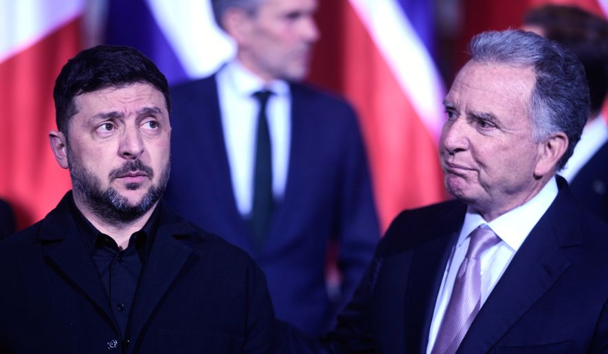 Ukraine's President Volodymyr Zelenskyy, left, and Steve Witkoff, special envoy of the United States, meet at the chancellery in Berlin, Germany, on Dec. 15, 2025. (AP Photo/Markus Schreiber, Pool)