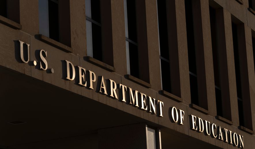 FILE - The headquarters of the U.S. Department of Education, March 12, 2025, in Washington. (AP Photo/Mark Schiefelbein, File)