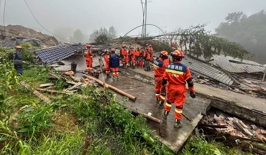In this photo released by Xinhua News Agency, rescuers conduct a rescue operation at the site of a mudslide following days of heavy rain from tropical cyclone Saudel in Suichuan County of Ji'an City, east China's Jiangxi Province on Saturday, Sept. 5, 2026. (China Anneng Group Second Engineering Bureau Co., Ltd./Xinhua via AP)
