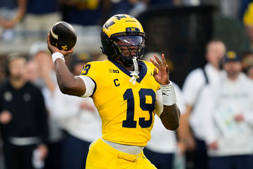 Michigan quarterback Bryce Underwood throws against Western Michigan during the first half of an NCAA college football game Saturday, Sept. 5, 2026, in Ann Arbor, Mich. (AP Photo/Paul Sancya)