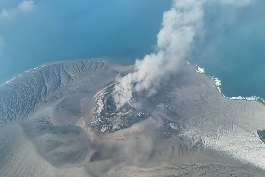 In this drone photo released by the Geological Agency (Badan Geologi) of Indonesia's Ministry of Energy and Mineral Resources, Mount Anak Krakatau spews volcanic smoke in Sunda Strait, Indonesia, Saturday, Sept. 5, 2026. (Badan Geologi via AP)