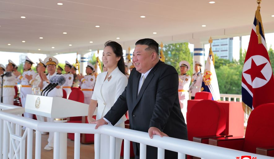 In this photo provided by the North Korean government, its leader Kim Jong Un and his daugther attend a commissioning ceremony of a destroyer, Kang Kon at a port in Wonsan, North Korea Sunday, Sept. 6, 2026. Independent journalists were not given access to cover the event depicted in this image distributed by the North Korean government. The content of this image is as provided and cannot be independently verified. Korean language watermark on image as provided by source reads: "KCNA" which is the abbreviation for Korean Central News Agency. (Korean Central News Agency/Korea News Service via AP)