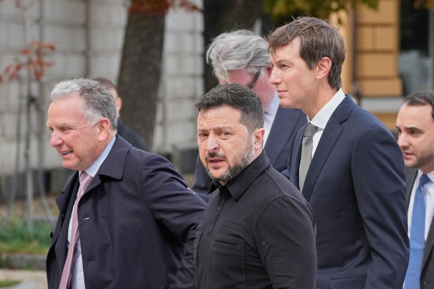 Ukraine's President Volodymyr Zelenskyy, center, and U.S. President Donald Trump's envoys Jared Kushner, right, and Steve Witkoff, left, walk prior to their talks in Kyiv, Ukraine, Sunday, Sept. 6, 2026. (AP Photo/Efrem Lukatsky)