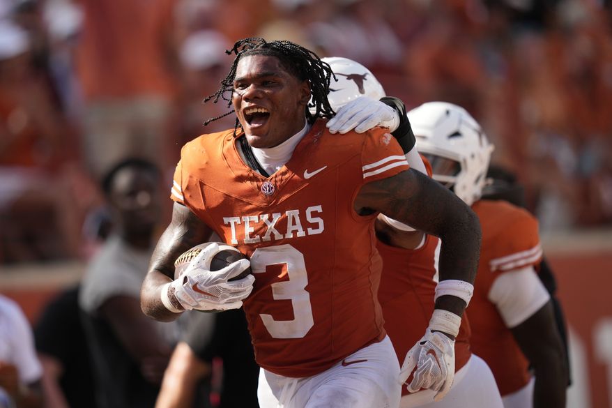 Texas linebacker Rasheem Biles (3) celebrates an interception against Texas State during the second half of an NCAA college football game in Austin, Texas, Saturday, Sept. 5, 2026. (AP Photo/Eric Gay)
