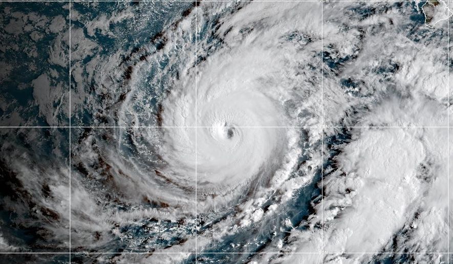 This satellite image released by NOAA shows Hurricane Lowell approaching Hawaii, Sunday, Sept. 6, 2026. (NOAA via AP)