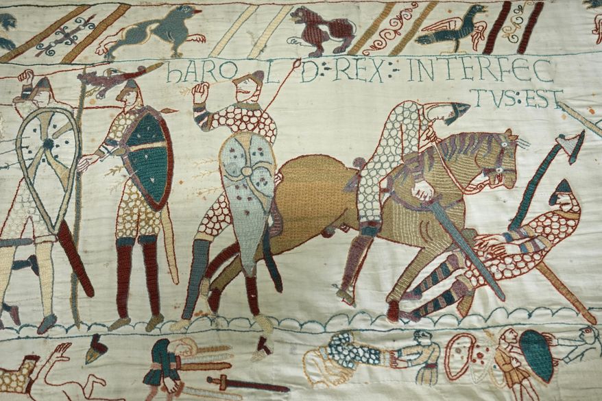 The 70-meter-long Bayeux Tapestry is displayed during a press preview at the British Museum in London after returning to England, following a historic agreement between the UK and France, Monday, Sept. 7, 2026. (AP Photo/Kin Cheung)
