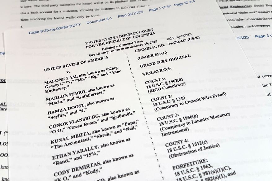 This Justice Department grand jury superseding indictment against Malone Lam and his co-defendants is photographed Friday, Sept. 4, 2026. (AP Photo/Jon Elswick)