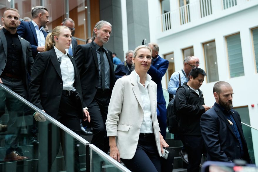 Co-leader of Alternative for Germany party, or AfD, Alice Weidel, leaves for a press conference in Berlin, Germany, Monday, Sept. 7, 2026. (AP Photo/Ebrahim Noroozi)