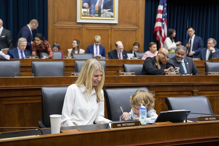 Rep. Brittany Pettersen, D-Colo., and her 3-year-old son Davis Silverii attend the House Financial Services Committee hearing regarding the state of the international financial system at the Capitol in Washington on Tuesday, June 13, 2023. (AP Photo/Amanda Andrade-Rhoades) **FILE**