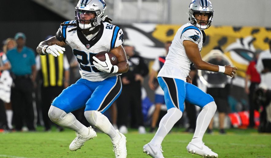 Carolina Panthers running back Jonathon Brooks runs for a touchdown against the Jacksonville Jaguars during the first half of an NFL preseason football game, Friday, Aug. 21, 2026, in Jacksonville, Fla. (AP Photo/Phelan M. Ebenhack)