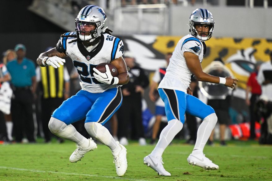 Carolina Panthers running back Jonathon Brooks runs for a touchdown against the Jacksonville Jaguars during the first half of an NFL preseason football game, Friday, Aug. 21, 2026, in Jacksonville, Fla. (AP Photo/Phelan M. Ebenhack)