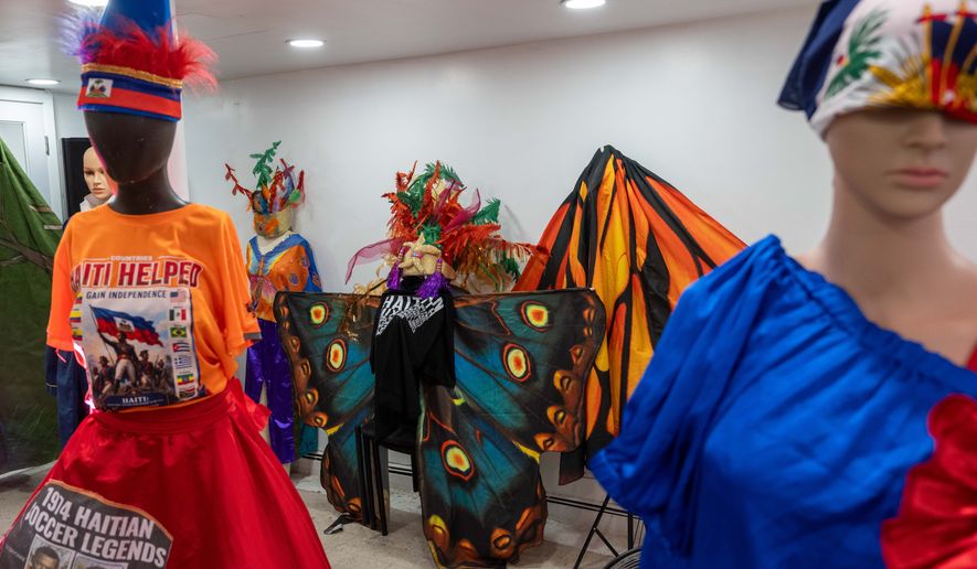 Haitian costumes for Lespri Ayiti Mas Camp are displayed ahead of the West Indian Day Parade, Thursday, Sept. 3, 2026, in the Brooklyn borough of New York. (AP Photo/Adam Gray)