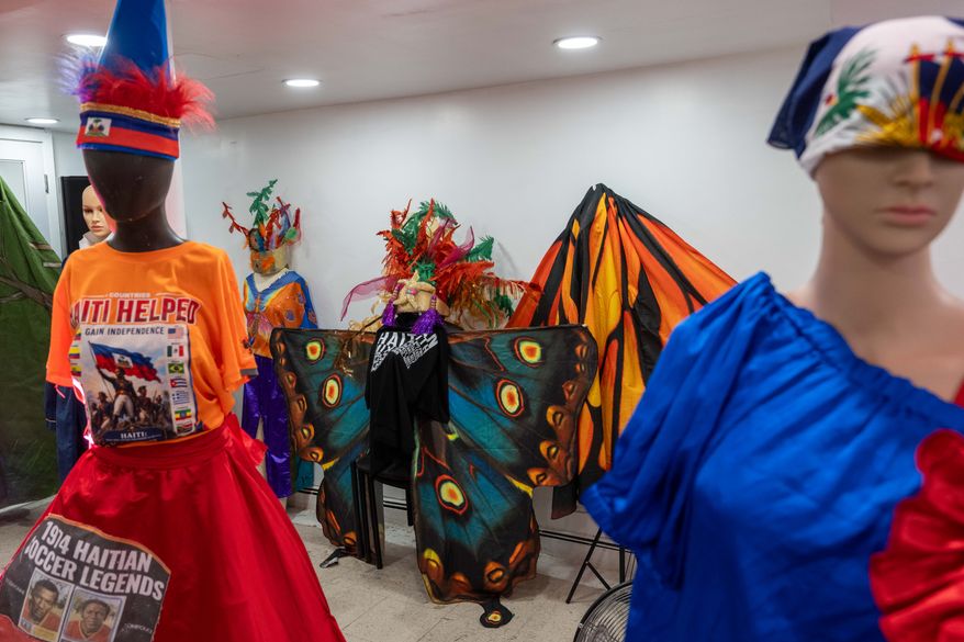 Haitian costumes for Lespri Ayiti Mas Camp are displayed ahead of the West Indian Day Parade, Thursday, Sept. 3, 2026, in the Brooklyn borough of New York. (AP Photo/Adam Gray)