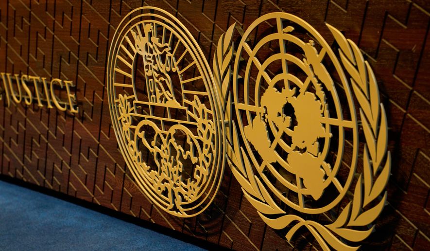 FILE - The logo of the International Court of Justice displayed on the judges' bench, in The Hague, Netherlands, May 4, 2026. (AP Photo/Peter Dejong, File)