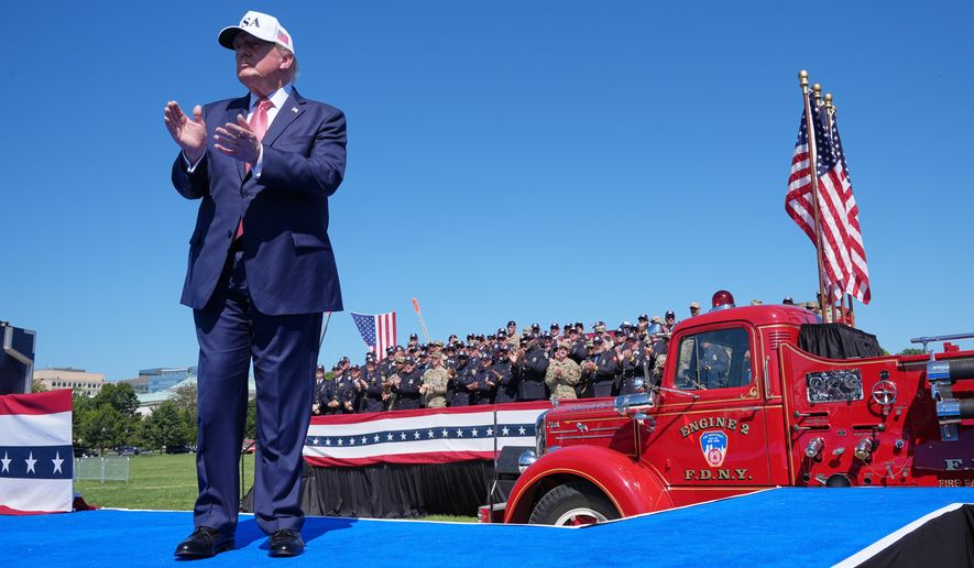 President Donald Trump claps after speaking during the Tunnel to Towers Foundation event for the 25th Anniversary of 9/11, on the Ellipse near the White House in Washington, Tuesday, Sept. 8, 2026. (AP Photo/Jacquelyn Martin)