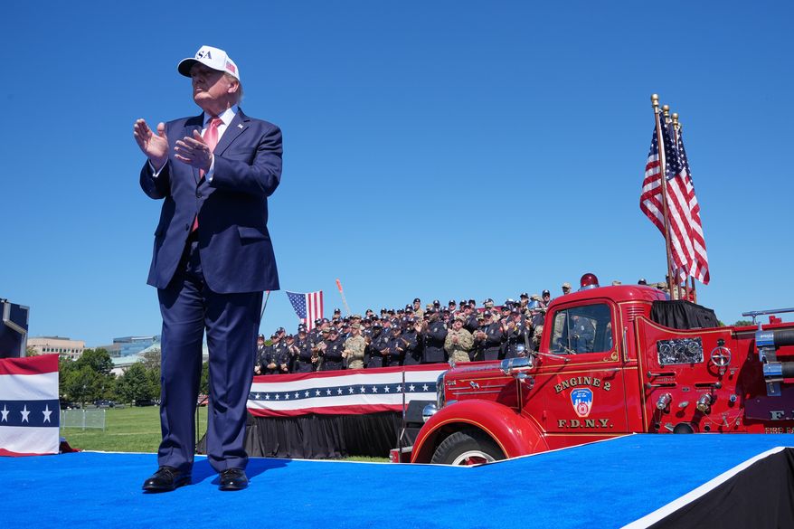 President Donald Trump claps after speaking during the Tunnel to Towers Foundation event for the 25th Anniversary of 9/11, on the Ellipse near the White House in Washington, Tuesday, Sept. 8, 2026. (AP Photo/Jacquelyn Martin)