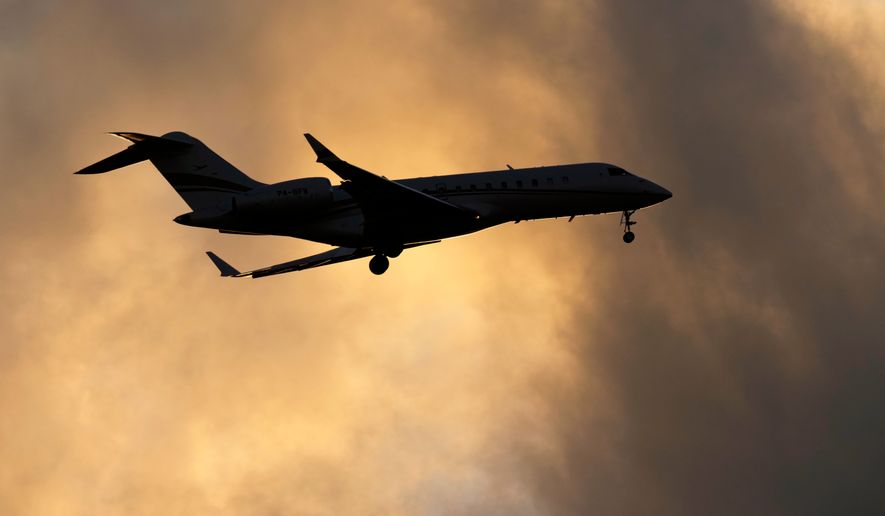 FILE - A Bombardier Global Express business jet approaches for landing in Lisbon, on June 13, 2023. (AP Photo/Armando Franca, File)