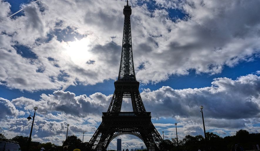 The Eiffel Tower reopens following a one-day strike over restrictions on women during a visit by a Hindu delegation, in Paris, Tuesday, Sept. 8, 2026. (AP Photo/Christophe Ena)