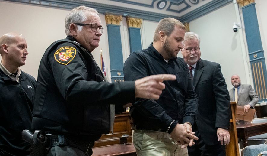 Jeriah Mast, a former missionary for Christian Aid Ministries, is taken into custody after his sentencing at Holmes County Courthouse Tuesday, Nov. 5, 2019 in Millersburg, Ohio. (Lake Fong/Pittsburgh Post-Gazette via AP)