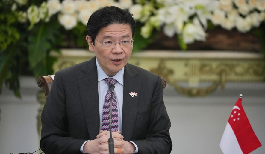 FILE - Singapore's Prime Minister Lawrence Wong speaks during a press conference in Jakarta, Indonesia, Monday, July 6, 2026. (AP Photo/Achmad Ibrahim, File)