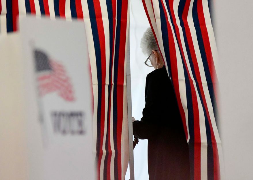 Camille Coulborn of Chesterfield, N.H., fills out her ballot inside a voting booth in Chesterfield during the New Hampshire State Primaries on Tuesday, Sept. 8, 2026. (Kristopher Radder/The Brattleboro Reformer via AP)