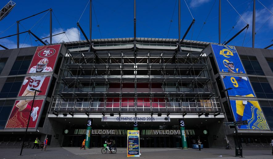 Outside the Melbourne Cricket Ground Wednesday, Sept. 9, 2026, in Melbourne, Australia, ahead of the NFL football game between the Los Angeles Rams and San Francisco 49ers. (AP Photo/Asanka Brendon Ratnayake)