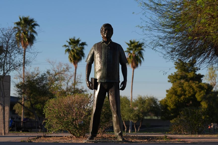 A statute of César Chavez stands in the middle of a plaza at Cesar Chavez Park, honoring the United Farm Workers union founder, March 18, 2026, in Laveen, Ariz. (AP Photo/Ross D. Franklin, File)