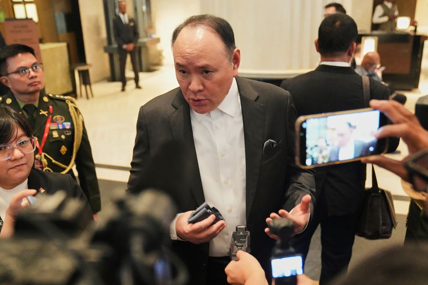Philippine's Defense Secretary Gilberto Teodoro talks to the media as he attends the Shangri-La Dialogue, Asia's annual defense and security forum, in Singapore on May 29, 2026. (AP Photo/Achmad Ibrahim, File)