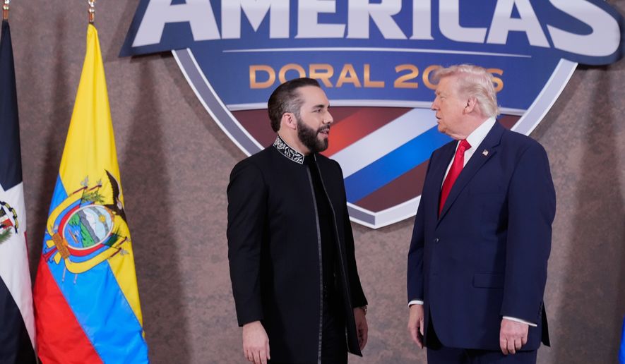 FILE - President Donald Trump greets El Salvador's President Nayib Bukele, left, at the Shield of the Americas Summit, March 7, 2026, at Trump National Doral Miami in Doral, Fla. (AP Photo/Mark Schiefelbein, File)
